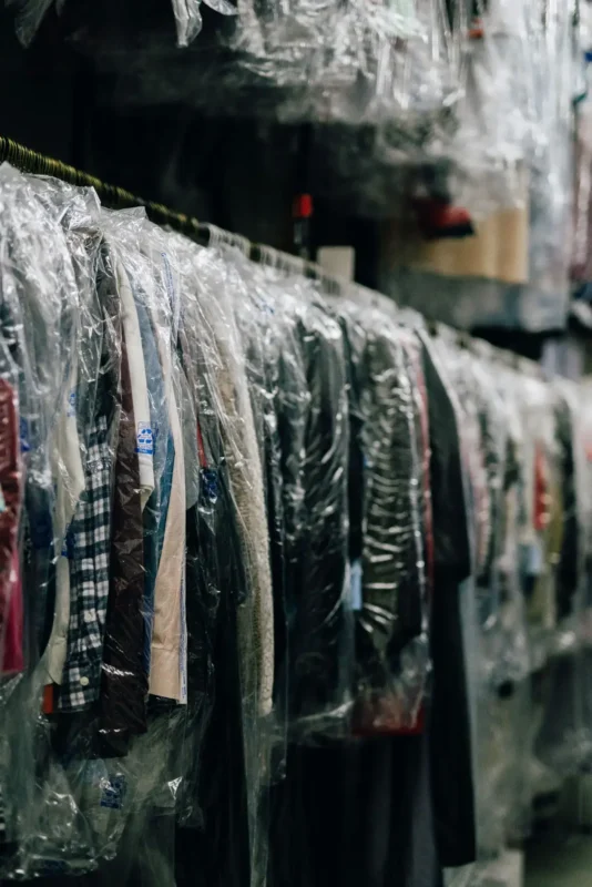 Racks of clothing on hangers
